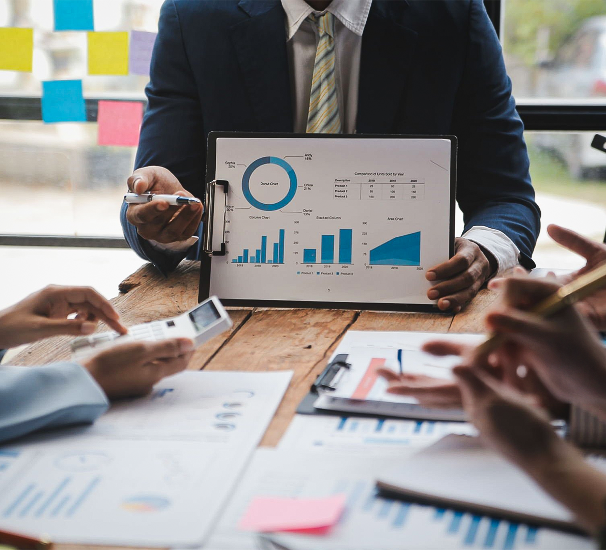 A photo of a model with a hidden face showing charts representing business performance, data analysis, and growth insights — highlighting expert business strategy and growth consulting solutions.